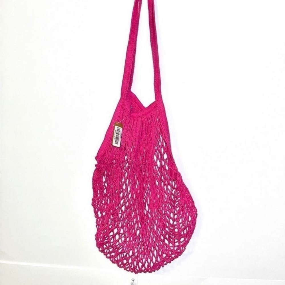 Dolls Kill pink fishnet net shopper reusable bag